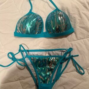 Venus swimwear, turquoise sequin bathing suit. Top is a D cup bottom are size 2